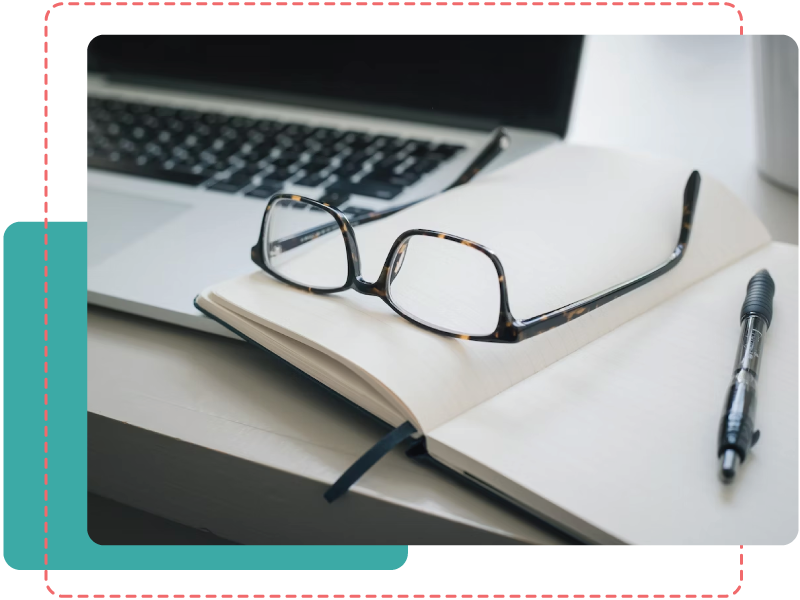 Laptop with Notebood and Glasses