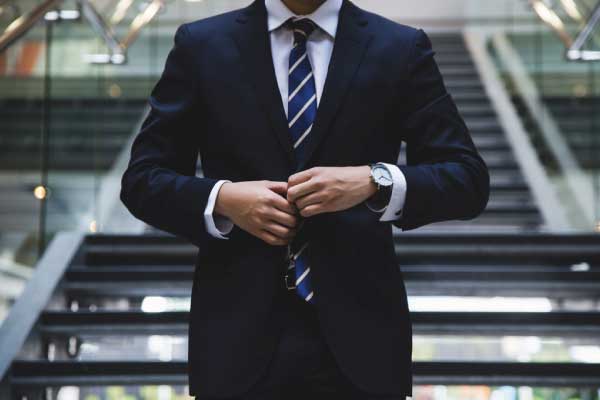 Business professional wearing a suit and tie