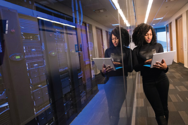 Woman by server farm