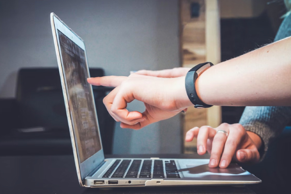Pointing at computer screen