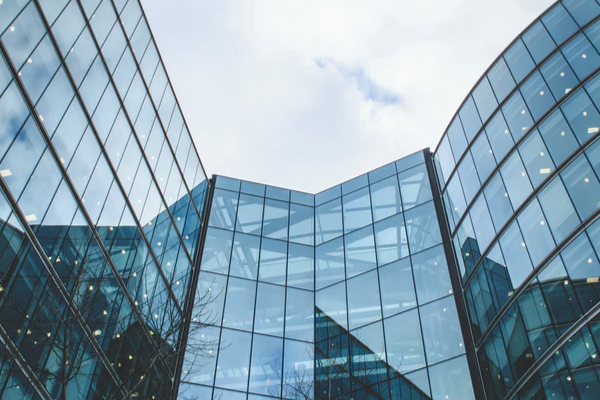 outside office building with large glass windows