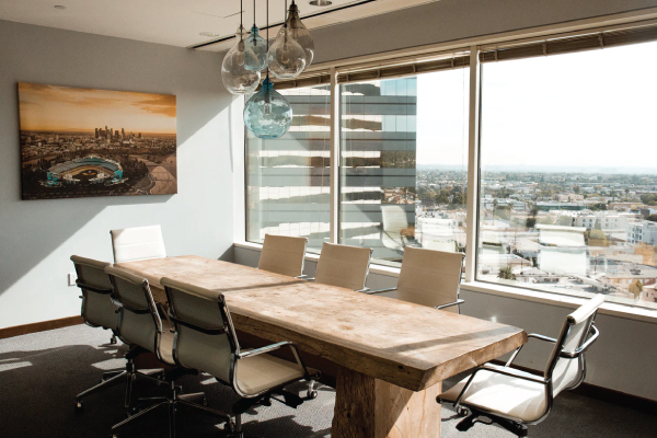 empty human resource boardroom with long table and chairs