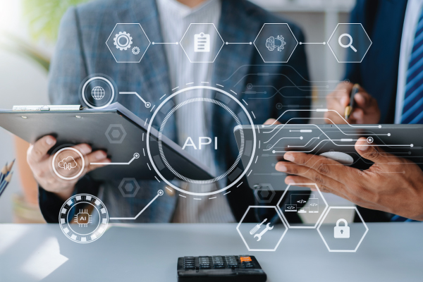 Two men working on tablets with technology overlay